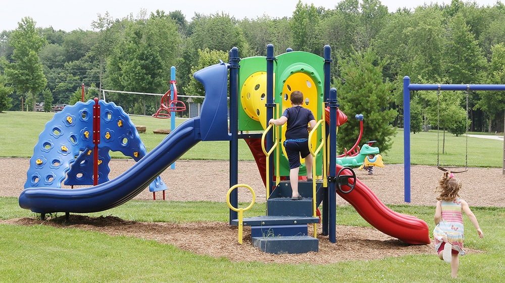 lincoln-pines-lakefront-resort-playground-summer