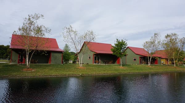View of several cottages along the water at Santa's Lakeside Cottages