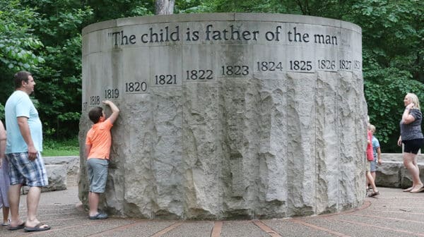 Child measures himself at the Lincoln Bicentennial Plaza inside Lincoln State Park